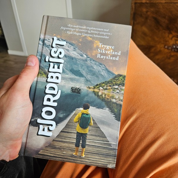 A physical copy of Fjordbeist by Trygve Sikveland Røysland